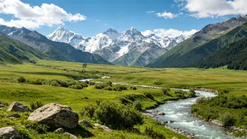 A small river winds across the vast grassland stretching all